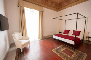 B. Sicilian Charming Stay Historical Suite
